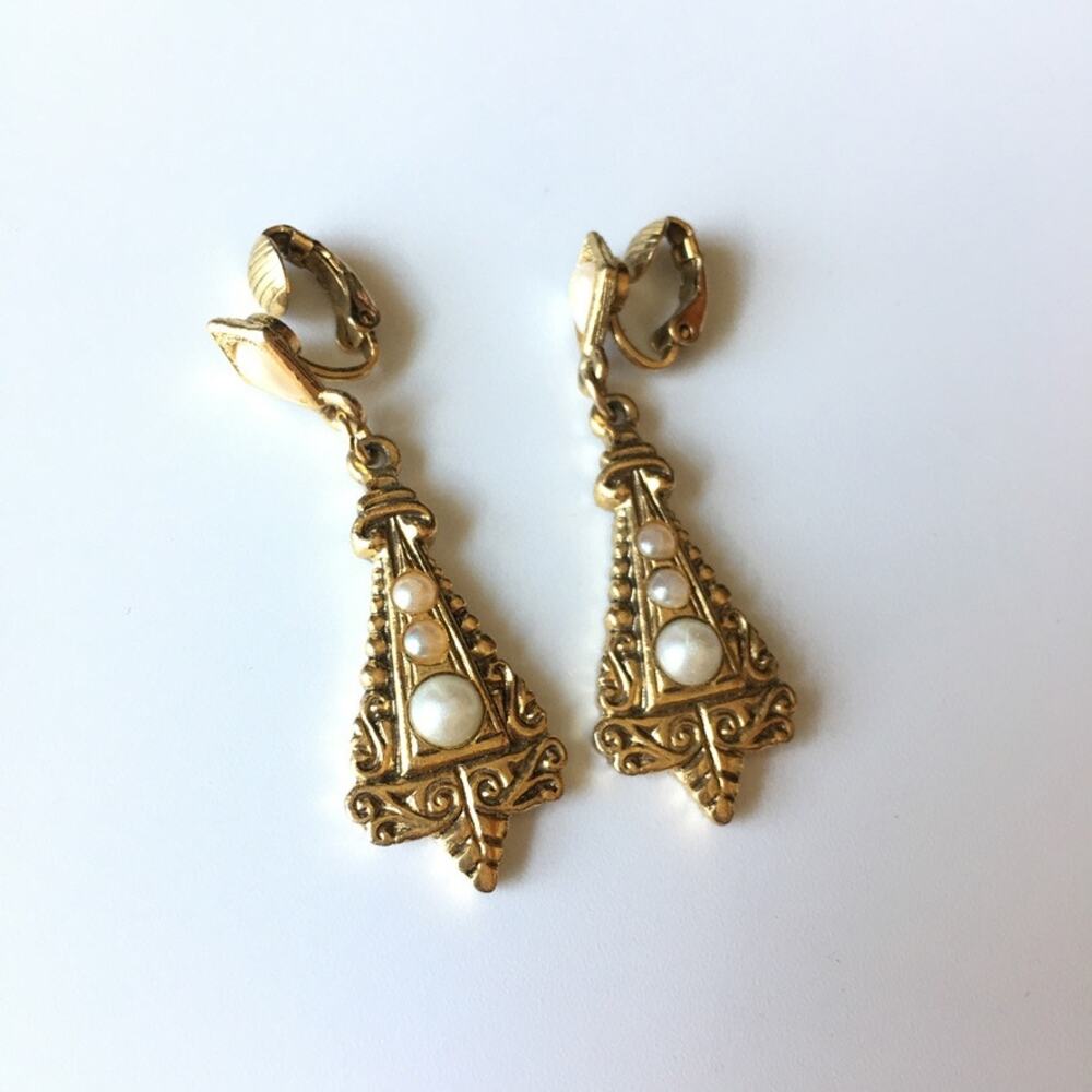 Ornate gold tone and faux pearl accent clip on earrings - Picture 2 of 7